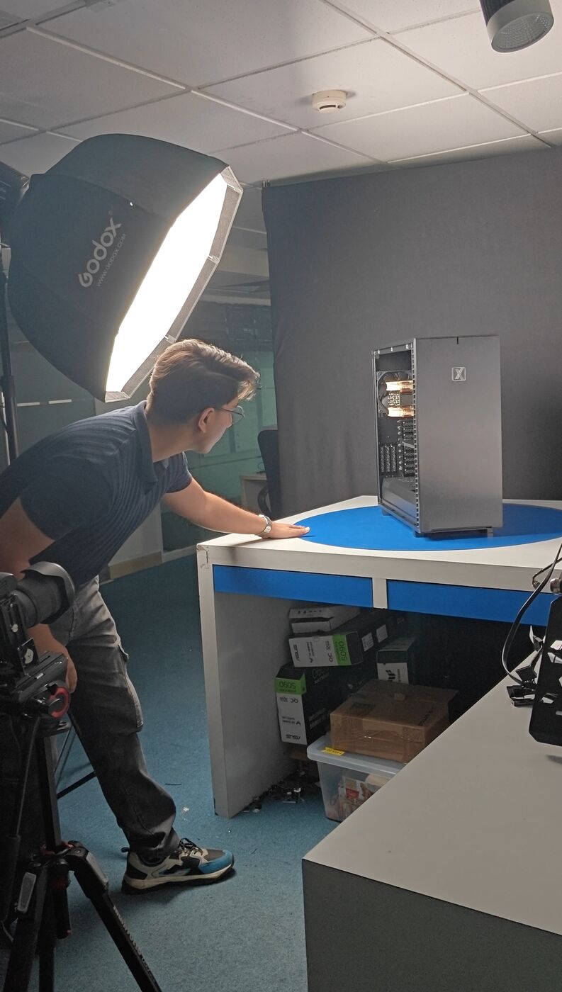 Divyansh setting up a workstation shoot at ProX PC