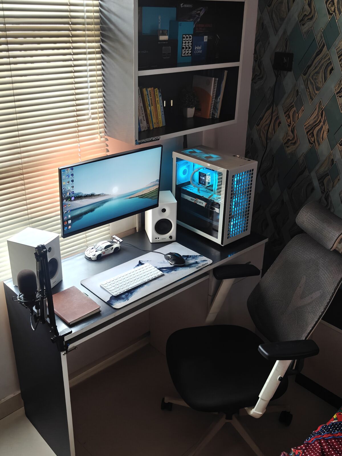 Divyansh's desk with a custom PC and monitor